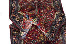 Corner detail of New Hamedan rug showing border pattern and Wool pile