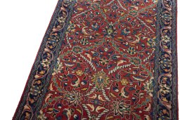 Backside of handmade New Hamedan rug showing knot structure and weave density