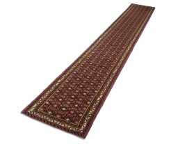 Corner detail of New Hamedan rug showing border pattern and Wool pile