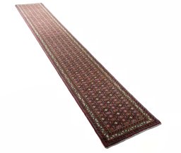 Close-up detail of New Hamedan rug from Iran / Persia showing Wool weave