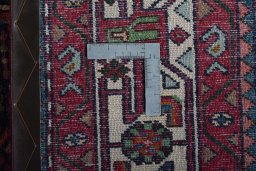 Backside of handmade 2000s Hamedan rug showing knot structure and weave density