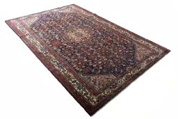 Close-up detail of 2000s Hamedan rug from Iran / Persia showing Wool weave