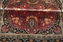 Close-up detail of 2000s Hamedan rug from Iran / Persia showing Wool weave