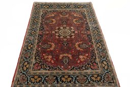 Surface texture of 2000s Hamedan rug with natural Wool and intricate pattern