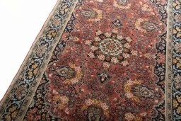 Backside of handmade 2000s Hamedan rug showing knot structure and weave density