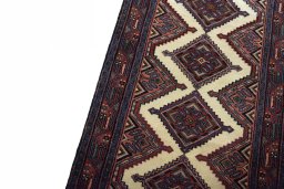 Backside of handmade New Hamedan rug showing knot structure and weave density