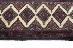 Close-up detail of New Hamedan rug from Iran / Persia showing Wool weave