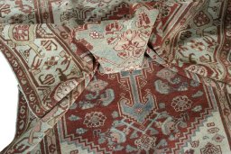 Surface texture of 1950s Hamedan rug with natural Wool and intricate pattern