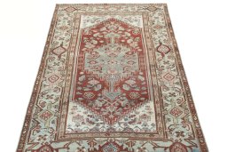 Surface texture of 1950s Hamedan rug with natural Wool and intricate pattern