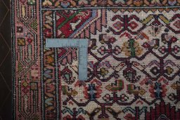 Close-up detail of 2000s Hamedan rug from Iran / Persia showing Wool weave