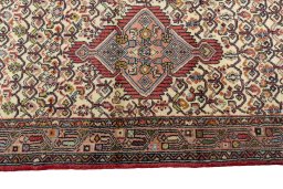 Close-up detail of 2000s Hamedan rug from Iran / Persia showing Wool weave