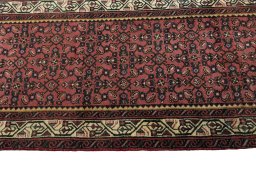 Close-up detail of 2000s Hamedan rug from Iran / Persia showing Wool weave
