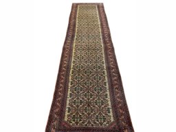 Surface texture of 2000s Hamedan rug with natural Wool and intricate pattern