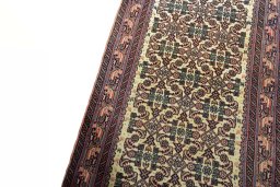 Backside of handmade 2000s Hamedan rug showing knot structure and weave density
