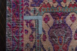 Backside of handmade 2000s Hamedan rug showing knot structure and weave density