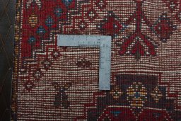 Corner detail of 2000s Hamedan rug showing border pattern and Wool pile