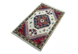 Corner detail of 2000s Hamedan rug showing border pattern and Wool pile