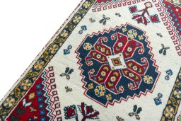 Backside of handmade 2000s Hamedan rug showing knot structure and weave density