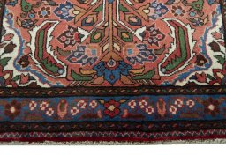 Close-up detail of New Hamedan rug from Iran / Persia showing Wool weave