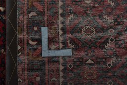 Close-up detail of 2000s Hamedan rug from Iran / Persia showing Wool weave