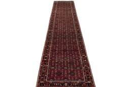 Surface texture of 2000s Hamedan rug with natural Wool and intricate pattern