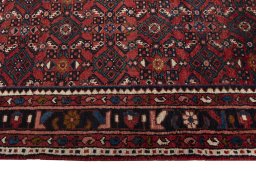 Close-up detail of 2000s Hamedan rug from Iran / Persia showing Wool weave