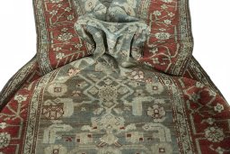 Corner detail of 1930s Hamedan rug showing border pattern and Wool pile