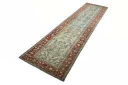 Corner detail of 1930s Hamedan rug showing border pattern and Wool pile