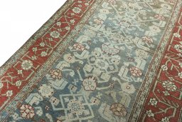 Backside of handmade 1930s Hamedan rug showing knot structure and weave density