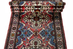 Corner detail of New Hamedan rug showing border pattern and Wool pile
