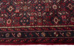 Close-up detail of New Hamedan rug from Iran / Persia showing Wool weave