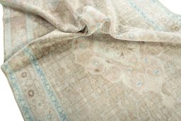 Surface texture of 1950s Hamedan rug with natural Wool and intricate pattern