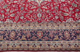 Corner detail of 2000s Hamedan rug showing border pattern and Wool pile