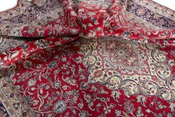 Surface texture of 2000s Hamedan rug with natural Wool and intricate pattern