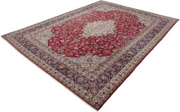 Corner detail of 2000s Hamedan rug showing border pattern and Wool pile