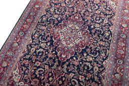 Backside of handmade New Hamedan rug showing knot structure and weave density