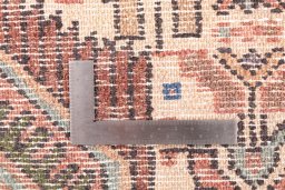 Corner detail of 1992s Hamedan rug showing border pattern and Wool pile