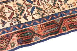 Backside of handmade 1992s Hamedan rug showing knot structure and weave density