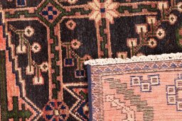Close-up detail of 1973s Hamedan rug from Iran / Persia showing Wool weave