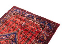 Surface texture of 1970s Hamedan rug with natural Wool and intricate pattern