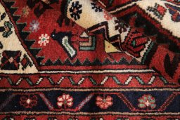 Corner detail of 1990s Hamedan rug showing border pattern and Wool pile