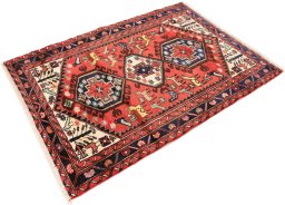 Corner detail of 1990s Hamedan rug showing border pattern and Wool pile