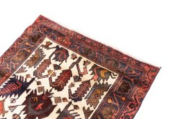 Surface texture of 1975s Hamedan rug with natural Wool and intricate pattern