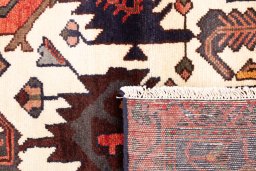 Close-up detail of 1975s Hamedan rug from Iran / Persia showing Wool weave