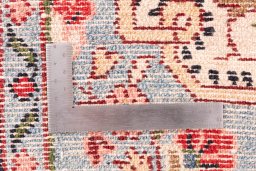 Corner detail of 1970s Hamedan rug showing border pattern and Wool pile