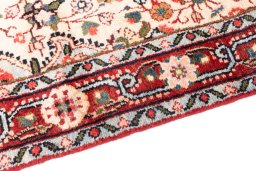 Backside of handmade 1970s Hamedan rug showing knot structure and weave density