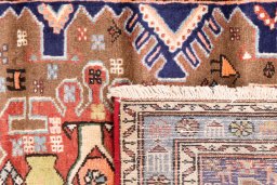 Close-up detail of 1994s Hamedan rug from Iran / Persia showing Wool weave