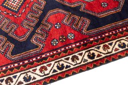 Backside of handmade 1996s Hamedan rug showing knot structure and weave density