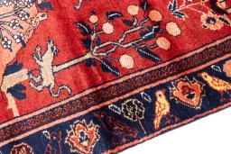 Backside of handmade 1995s Hamedan rug showing knot structure and weave density