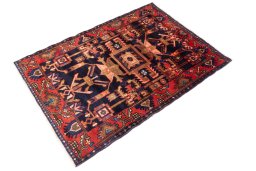 Close-up detail of 1970s Hamedan rug from Iran / Persia showing Wool weave